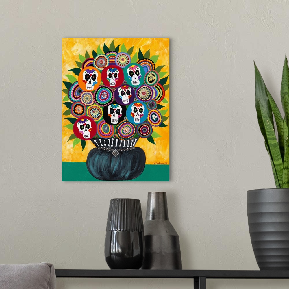 A modern room featuring Vase with flowers decorated with Day of the Dead sugar skulls.