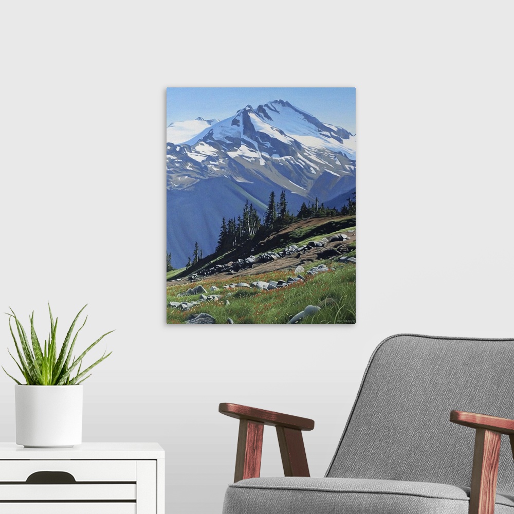 A modern room featuring Painting of a snow topped mountain peak and a wilderness landscape in green on the foreground.