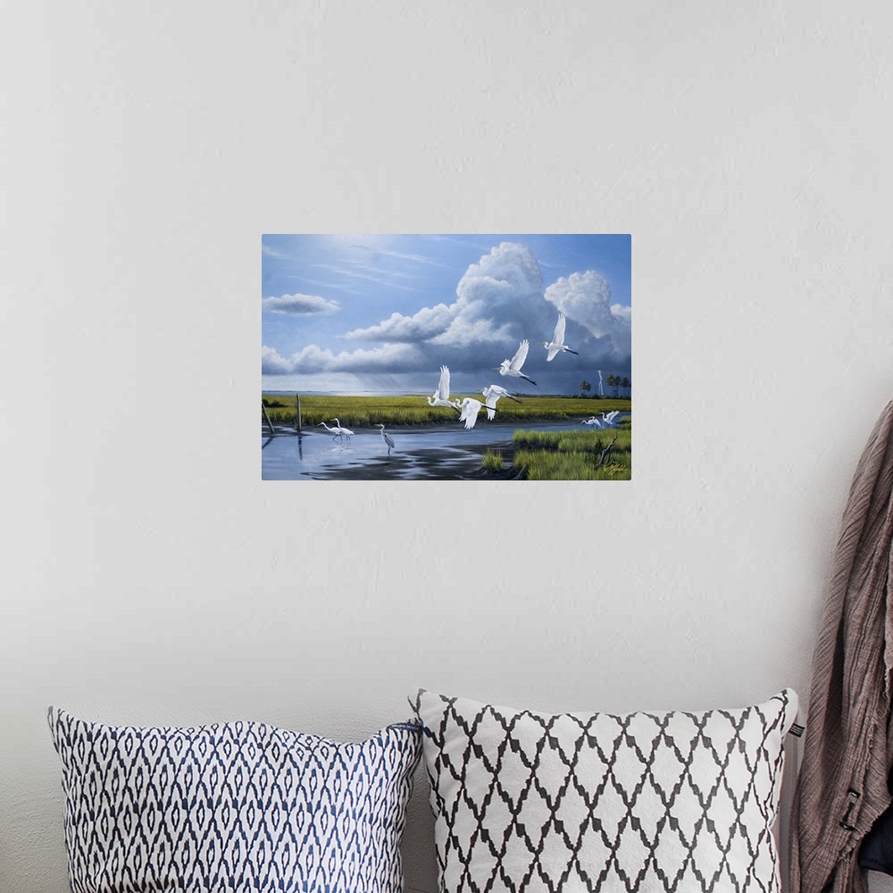 A bohemian room featuring A flock of egrets in flight over a marsh with storm clouds in the distance.