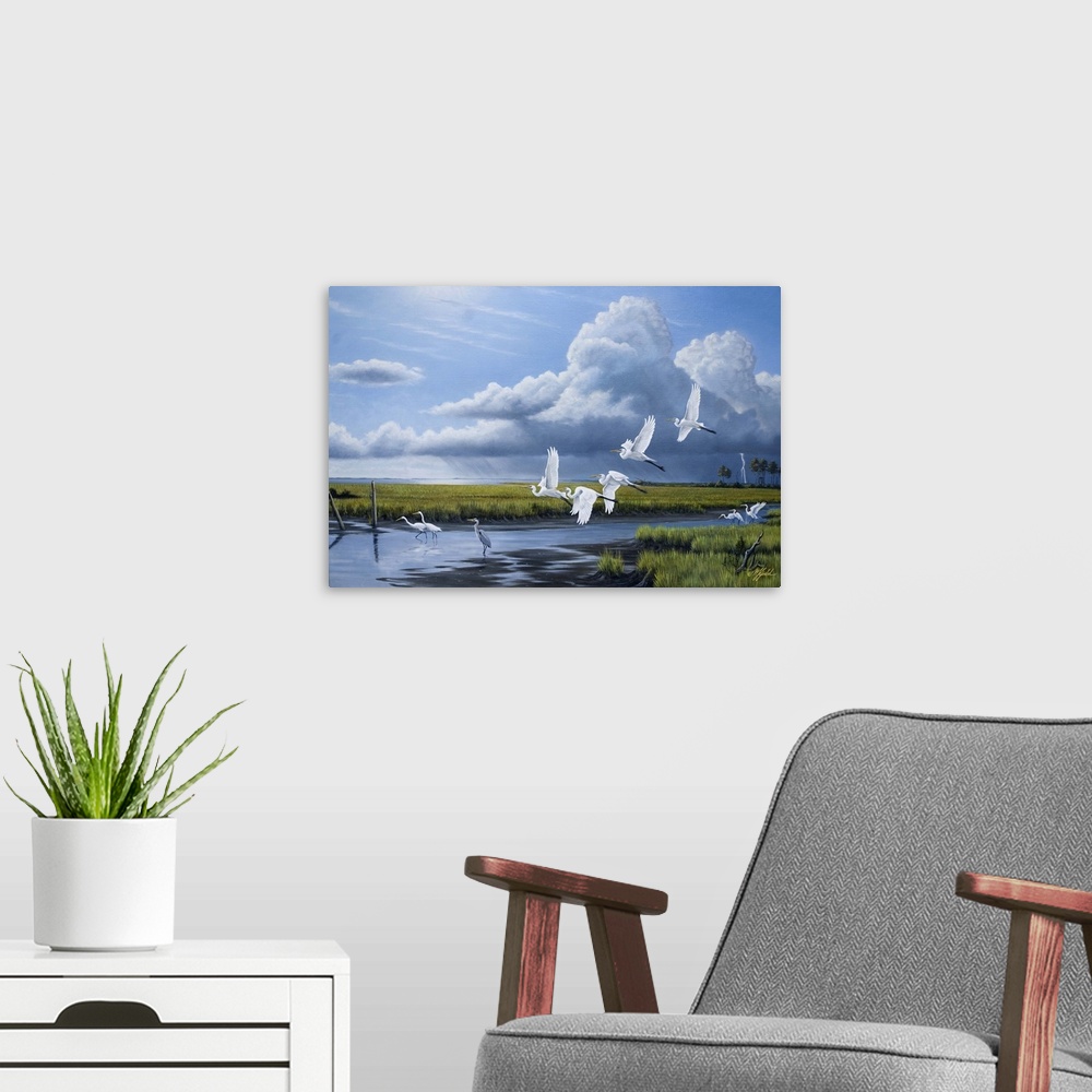 A modern room featuring A flock of egrets in flight over a marsh with storm clouds in the distance.