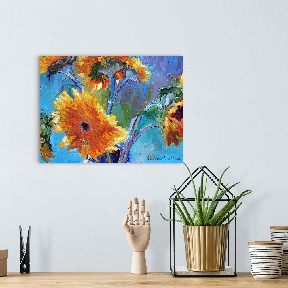 A bohemian room featuring Contemporary colorful painting of sunflowers.