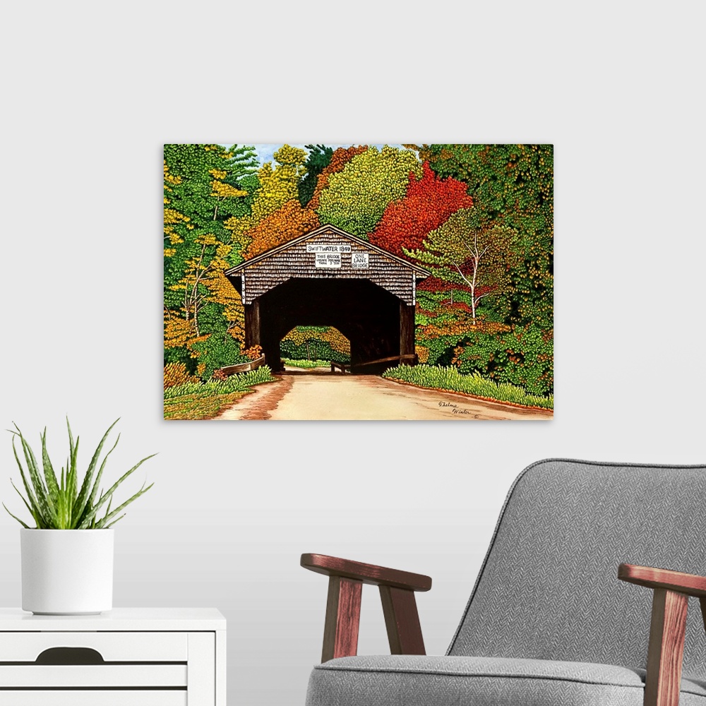 A modern room featuring Contemporary artwork of a covered bridge surrounded by autumn foliage.
