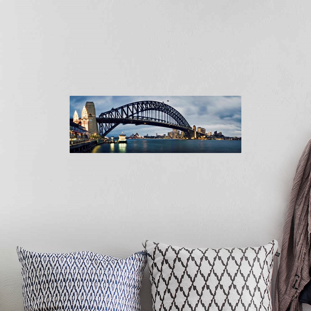 A bohemian room featuring A photograph of the Sydney harbor bridge in Australia.