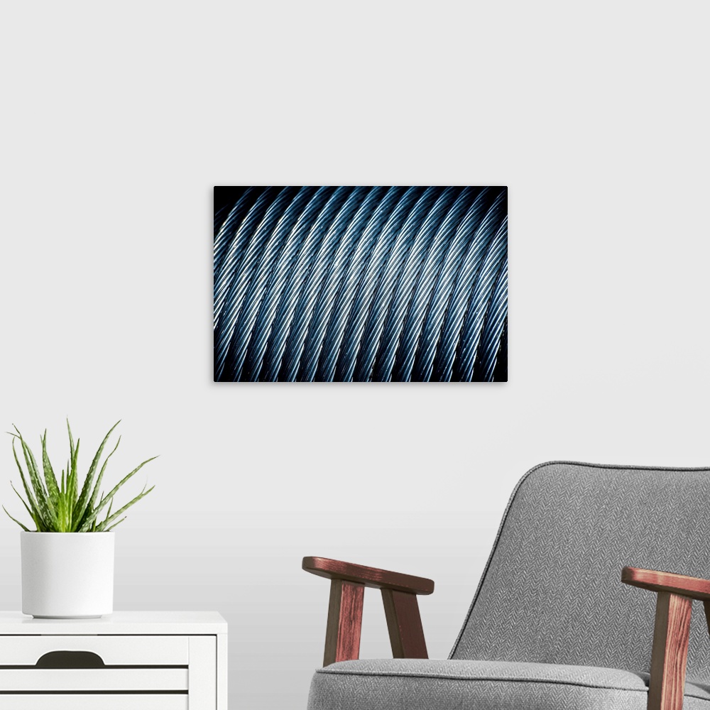 A modern room featuring Close-up photograph of coiled up metal wire.