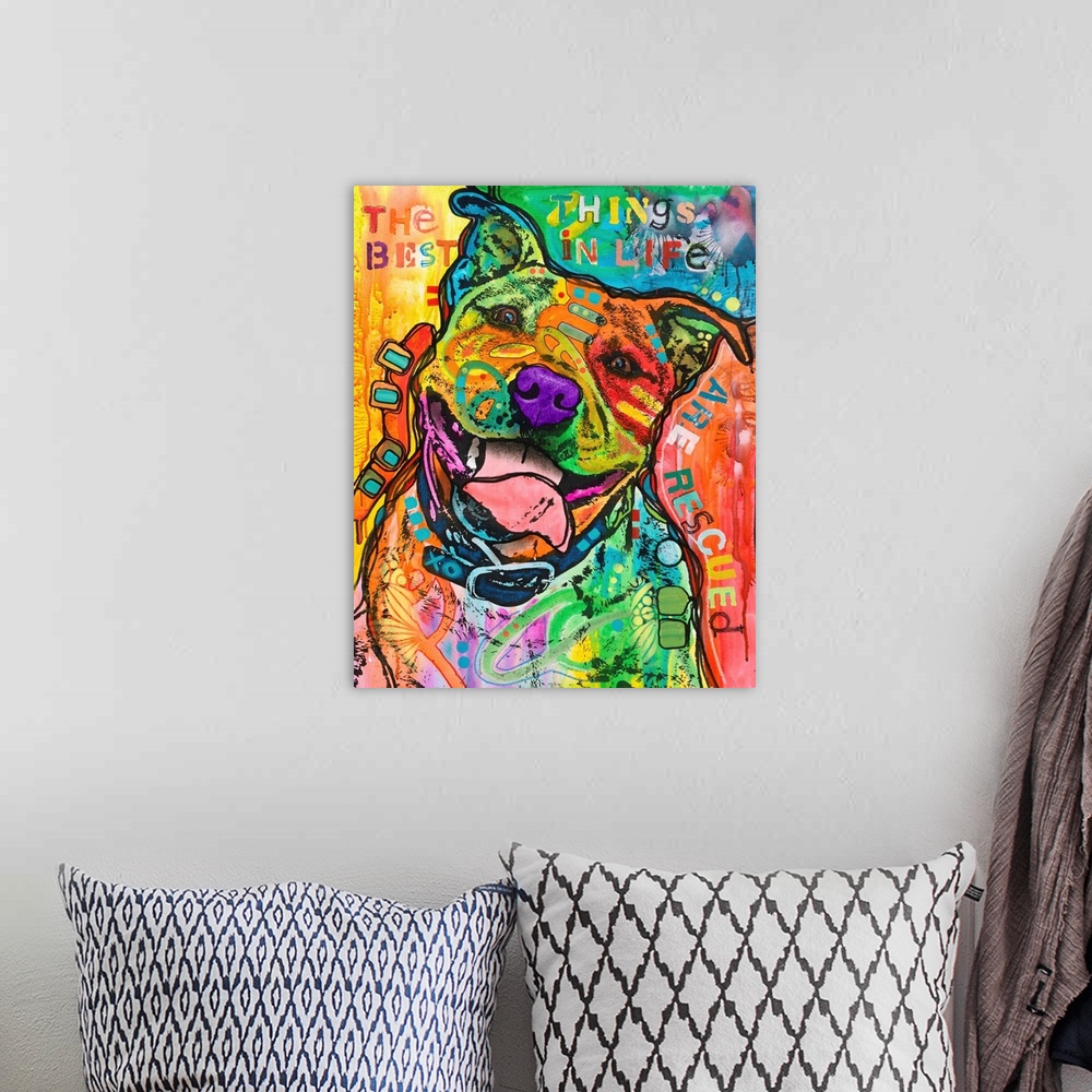 A bohemian room featuring "The Best Things In Life Are Rescued" written around a colorful painting of a dog covered in abst...
