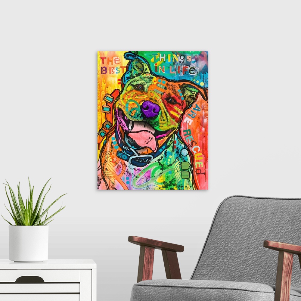 A modern room featuring "The Best Things In Life Are Rescued" written around a colorful painting of a dog covered in abst...