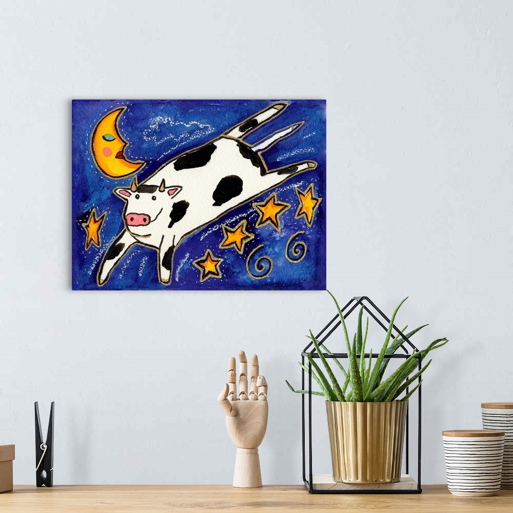 A bohemian room featuring A black and white cow jumping over stars in the night sky.