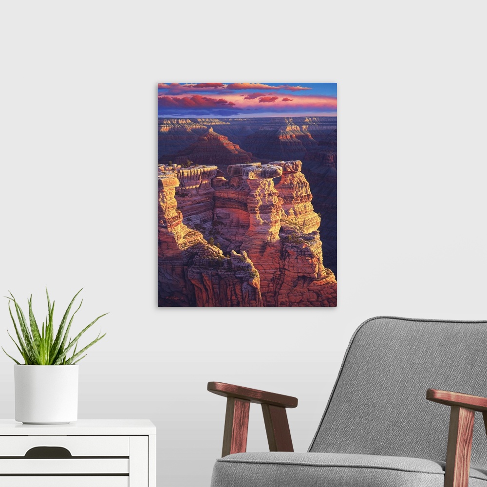 A modern room featuring The sun setting on the cliffs of the Grand Canyon.