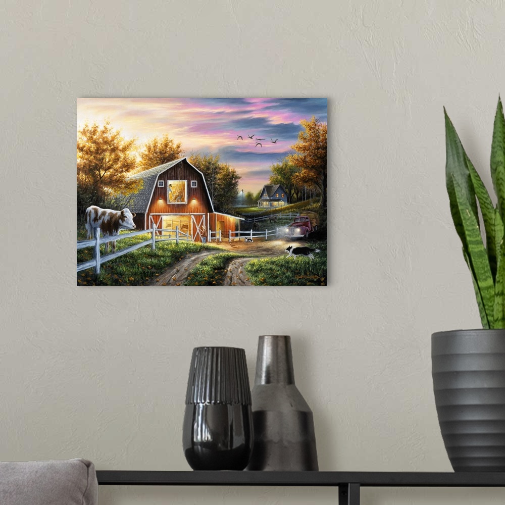 A modern room featuring Contemporary painting of a barn lit up at night under a beautiful sunset.