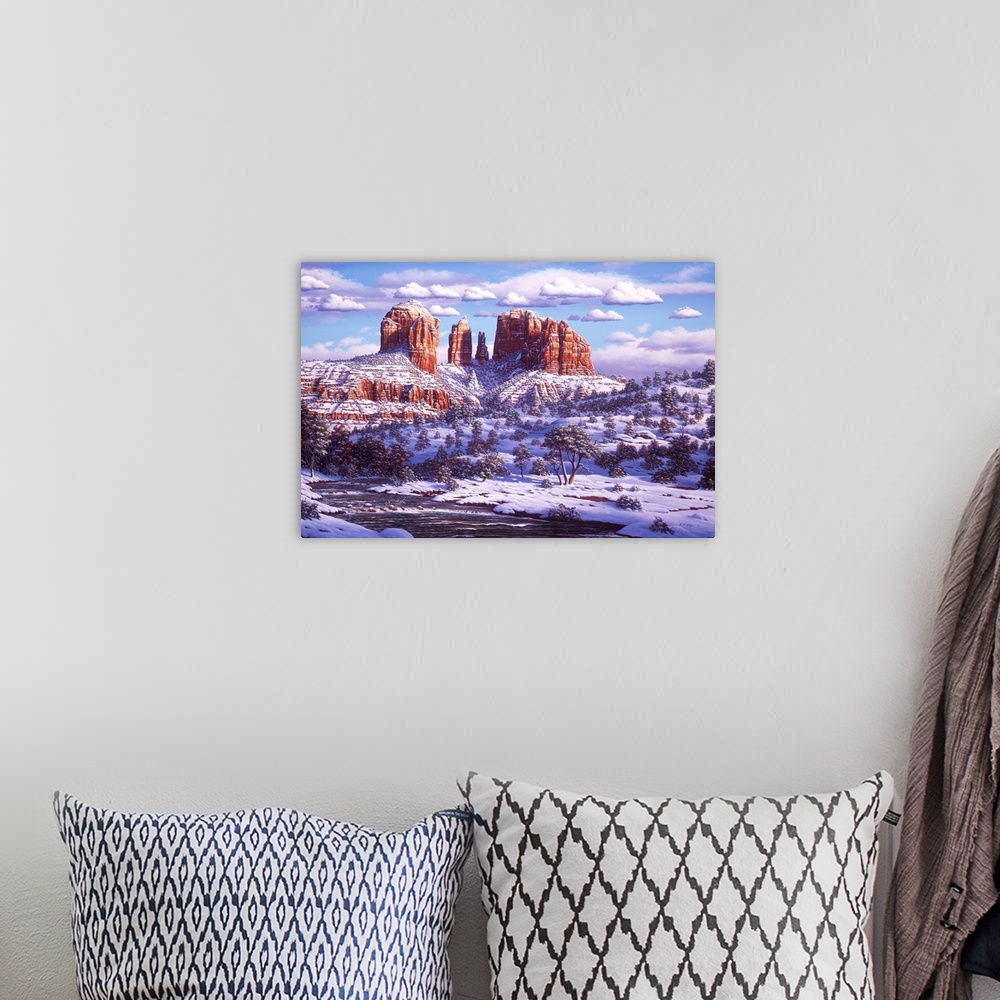 A bohemian room featuring Red Rocks in the winter, covered in snow.