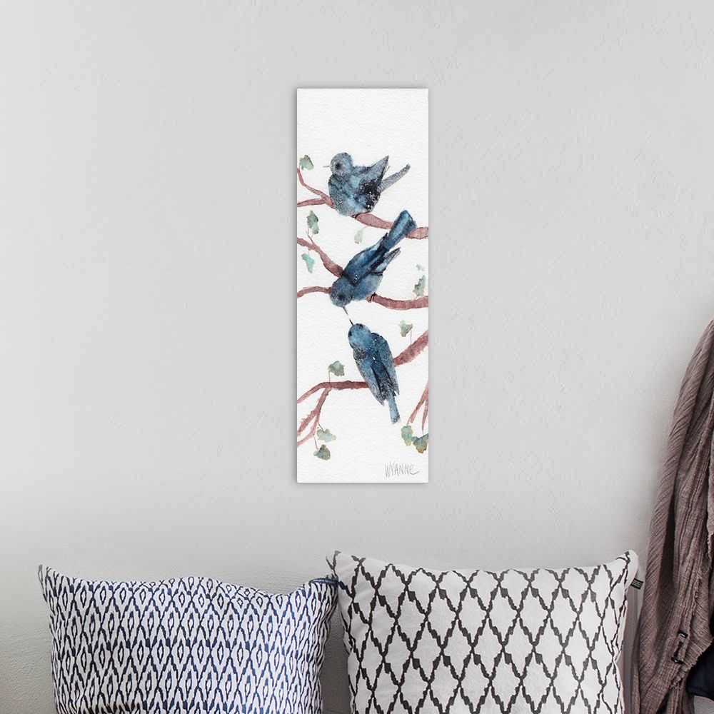 A bohemian room featuring Three blue watercolor birds sitting in branches.