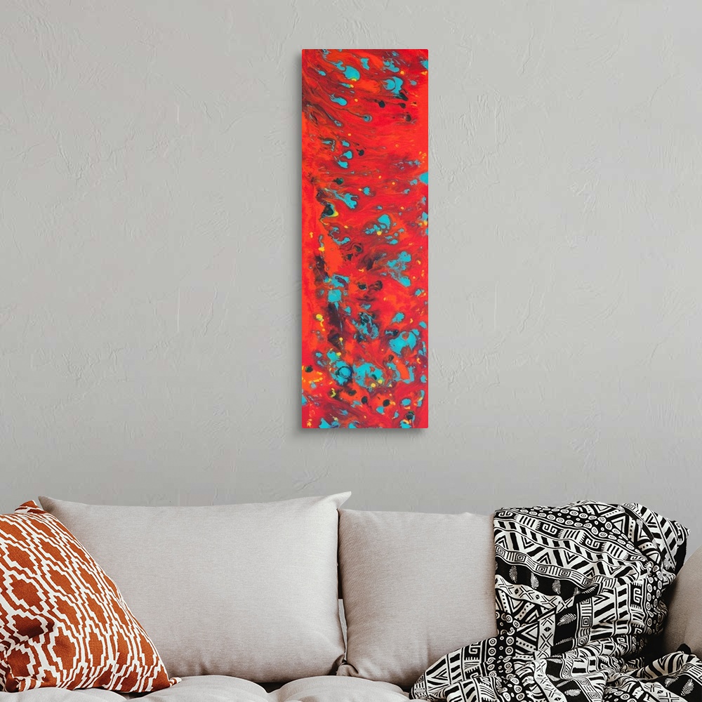 A bohemian room featuring Contemporary abstract painting in red with blue spots.