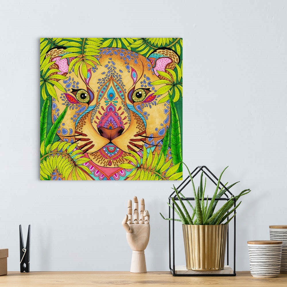 A bohemian room featuring Square illustration of a uniquely designed lion's head peaking through green foliage.
