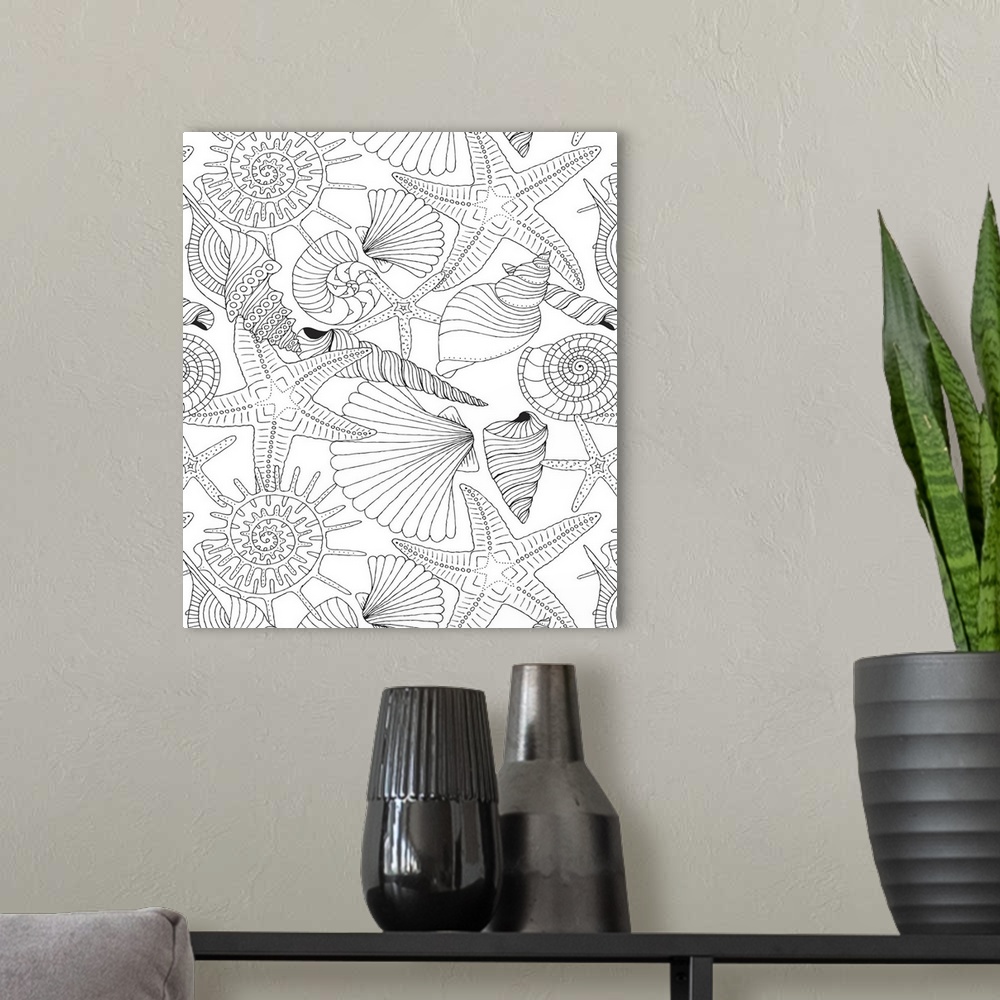 A modern room featuring Tropical themed black and white line art of different types of seashells and starfish.