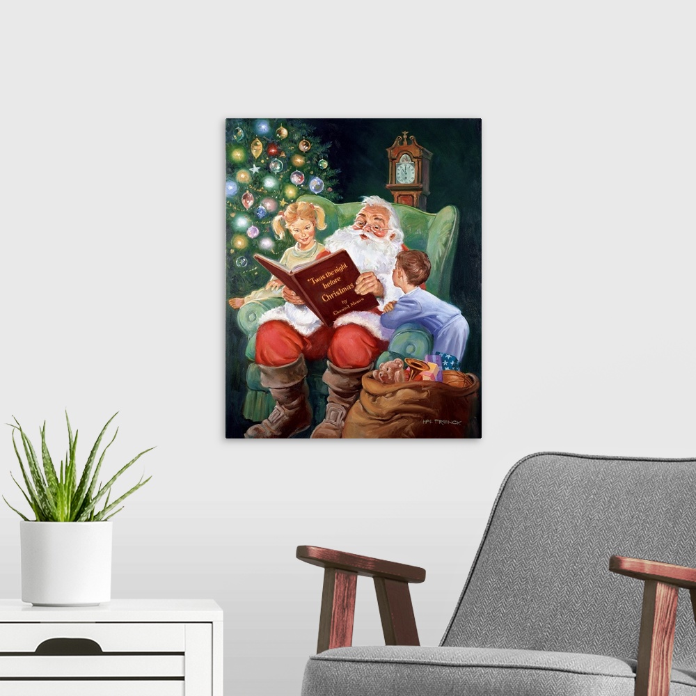 A modern room featuring Santa reading Twas The Night Before Christmas with a young boy and girl on either side, next to a...