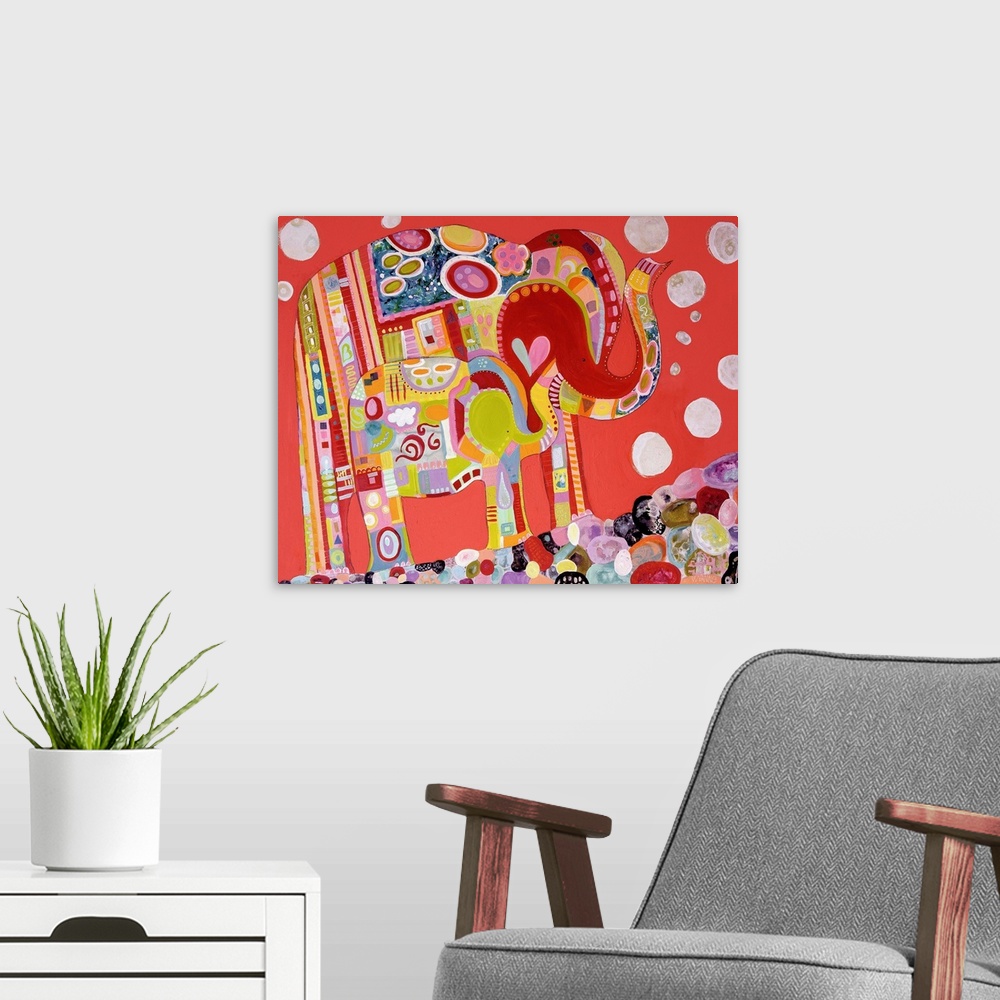 A modern room featuring Two colorful patterned elephants against a red sky.