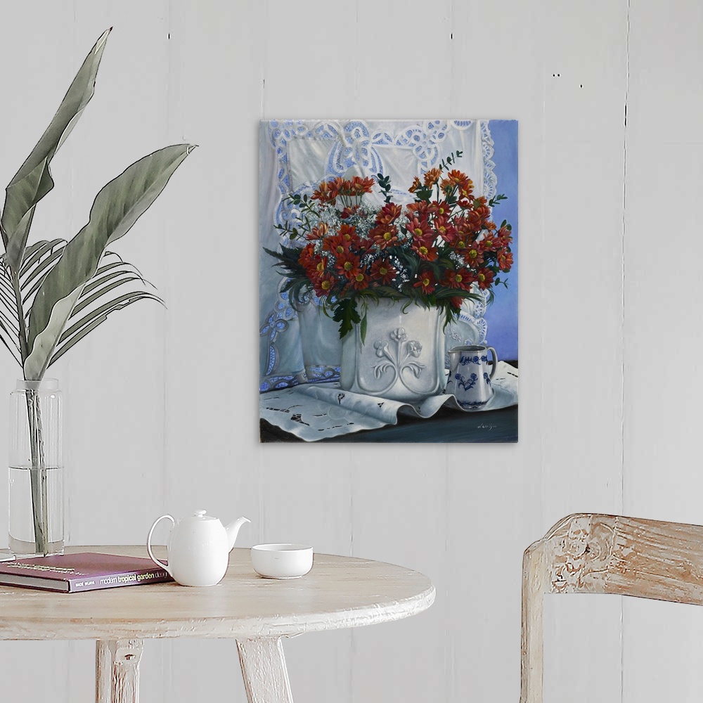 A farmhouse room featuring Contemporary still life painting of an elegant vase of red flowers.