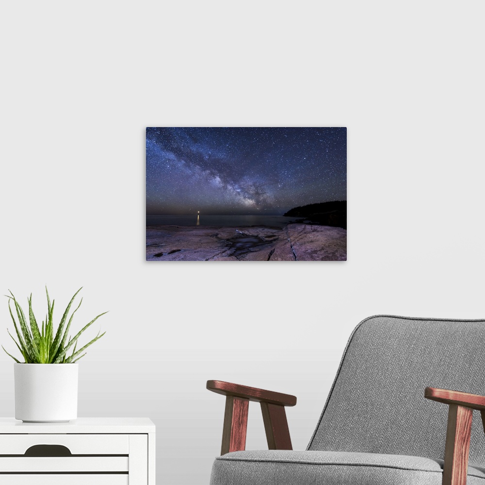 A modern room featuring Nighttime photograph of a starscape highlighting Venus over Acadia National Park, Maine.
