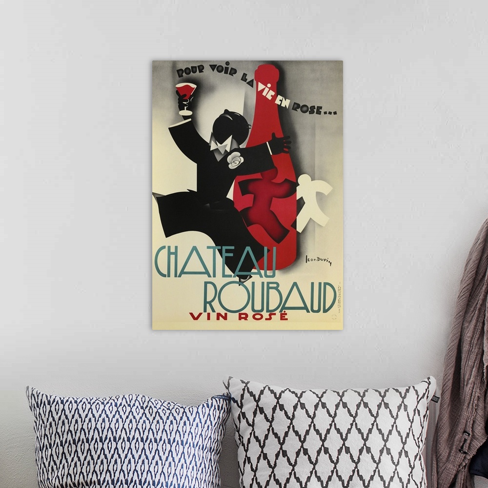 A bohemian room featuring Vintage advertisement artwork for Chateau Roubaud.