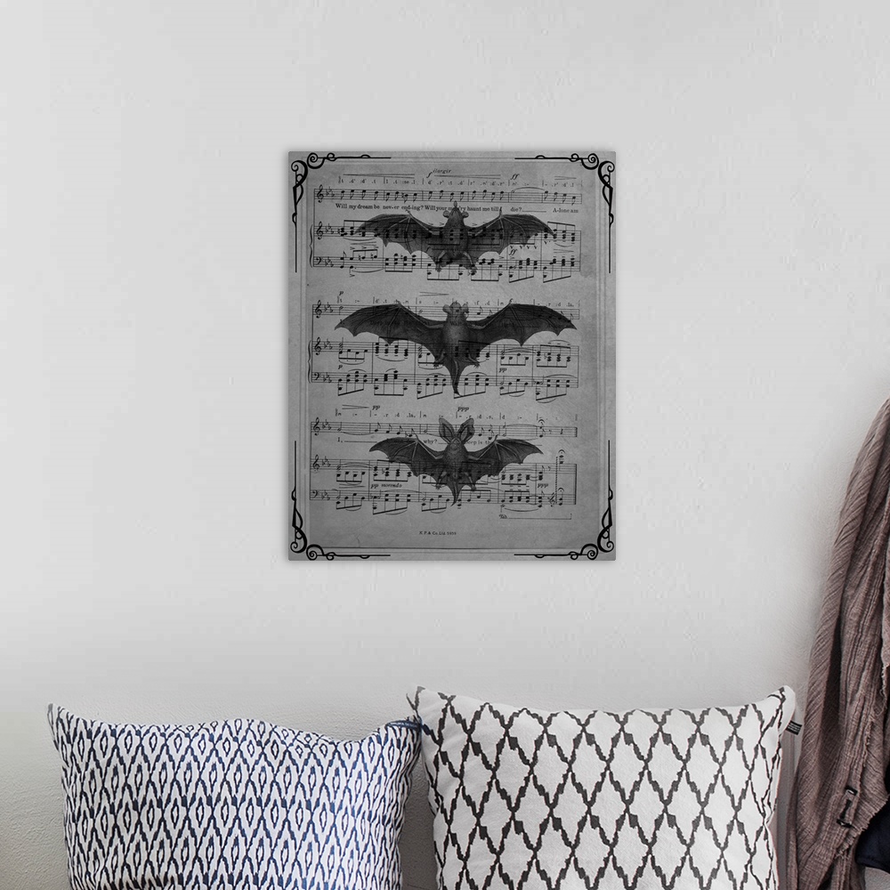 A bohemian room featuring Black and white vintage sheet music with three bats on top.