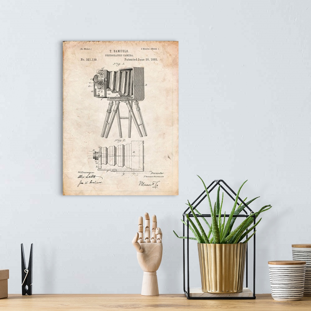 A bohemian room featuring Vintage Parchment Iconic Photographic Camera 1885 Patent Poster