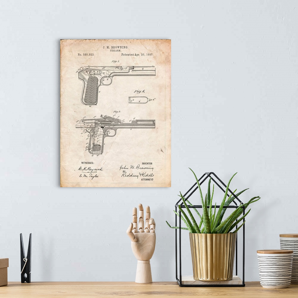 A bohemian room featuring Vintage Parchment J.M. Browning Pistol Patent Poster