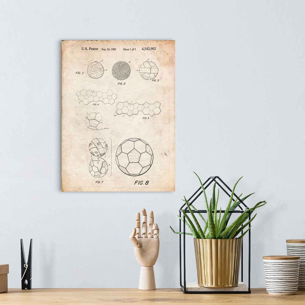 A bohemian room featuring Vintage Parchment Soccer Ball 1985 Patent Poster