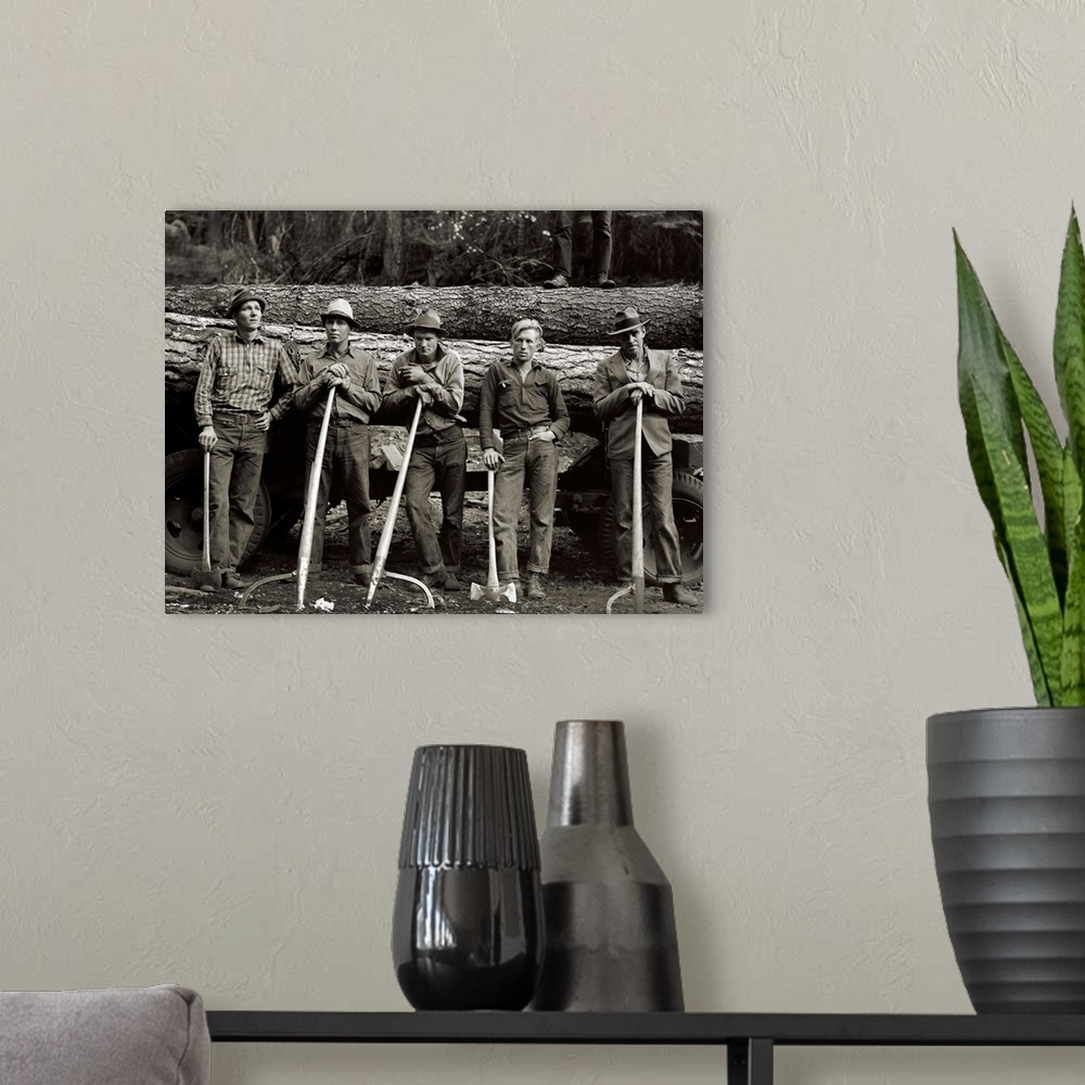 A modern room featuring Vintage Photograph of Logging crew standing in front of felled tree on a wagon
