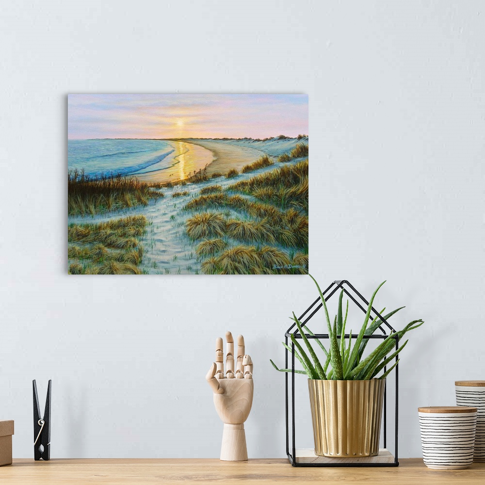 A bohemian room featuring Contemporary artwork of a beach and ocean scene at sunset.