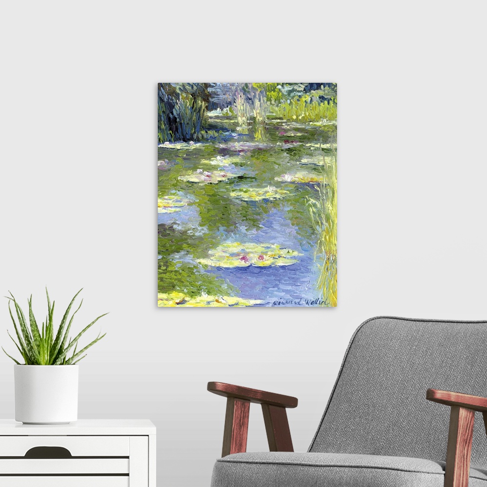 A modern room featuring Contemporary colorful painting of waterlilies in a pond.