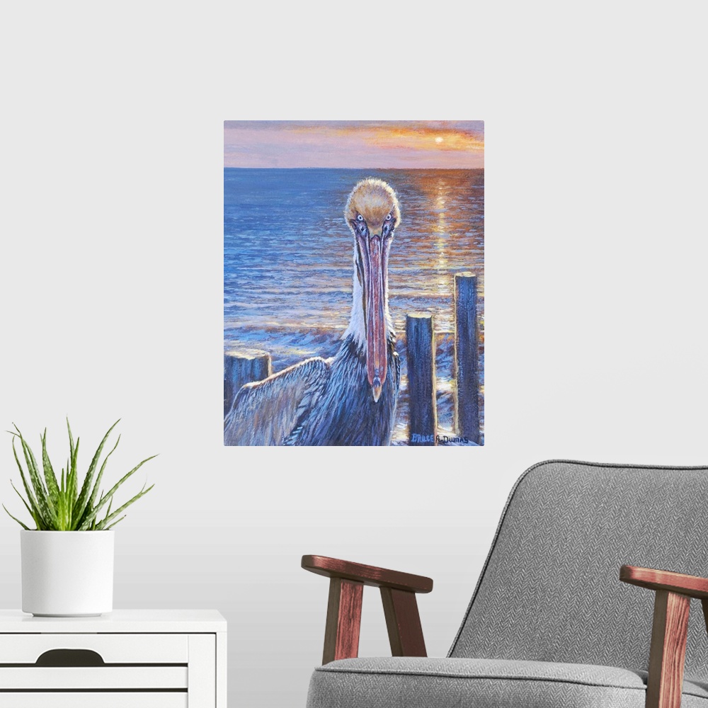 A modern room featuring Contemporary painting of a pelican on the beach at sunset, next to some wooden posts.