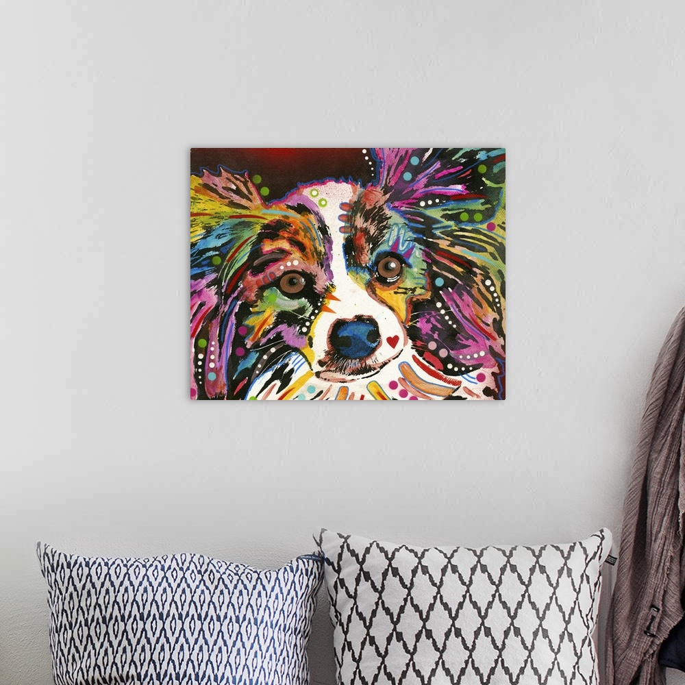 A bohemian room featuring Colorful painting of a Papillon with geometric markings on a deep red and black background.