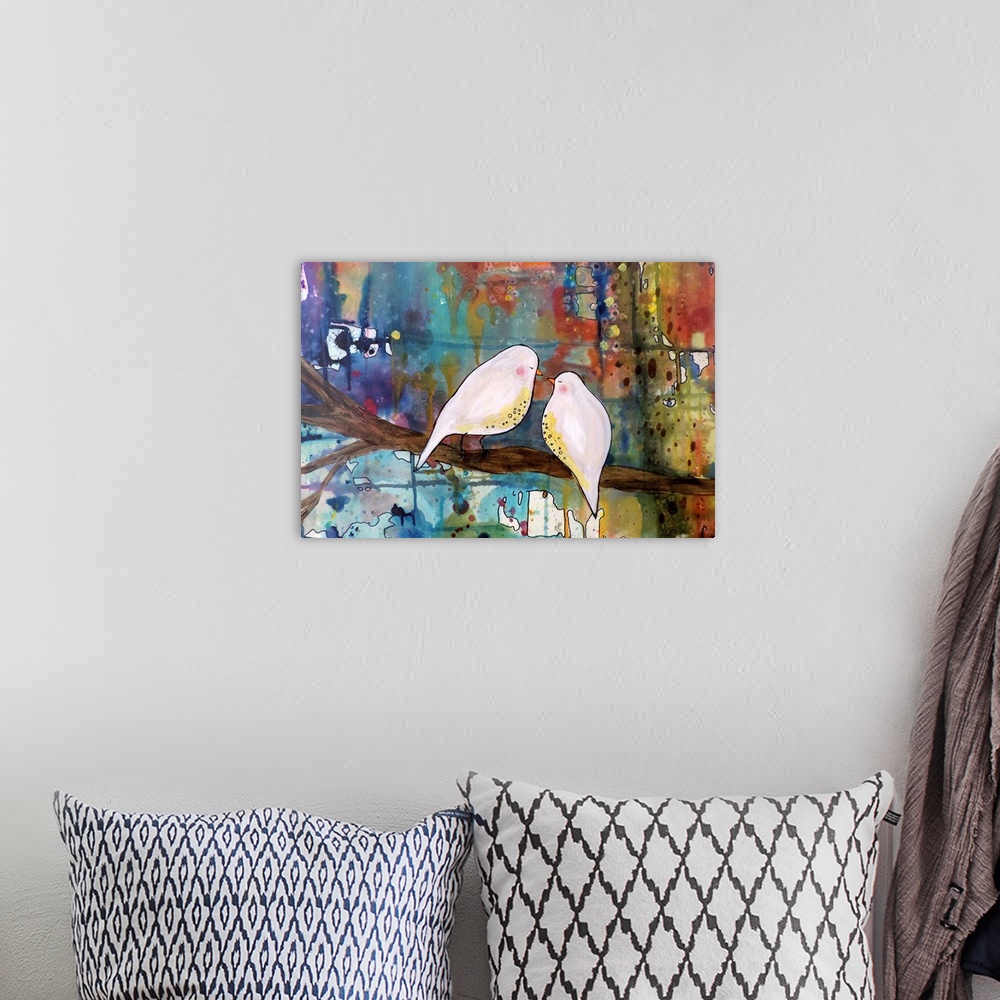 A bohemian room featuring Colorful contemporary painting of two white birds on a branch against a colorful background.
