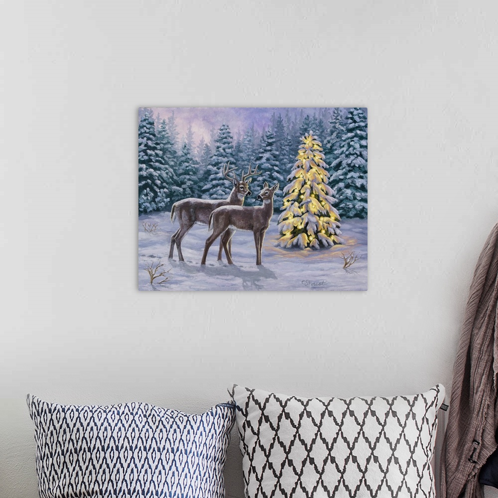 A bohemian room featuring A pair of deer standing in the snow next to a lit Christmas tree.
