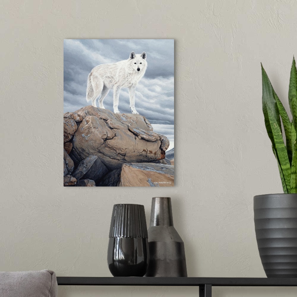 A modern room featuring A white wolf stands on a rock face.