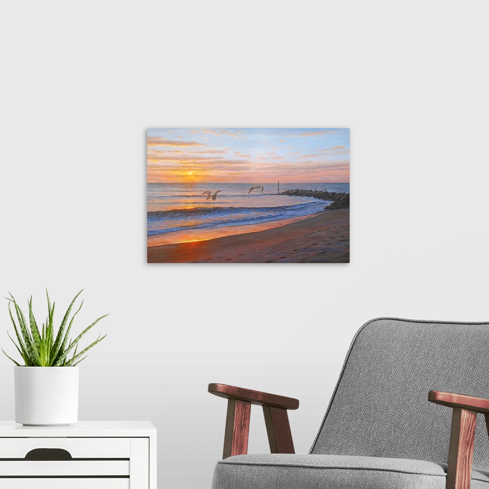 A modern room featuring Contemporary artwork of a beach at sunset with pelicans.