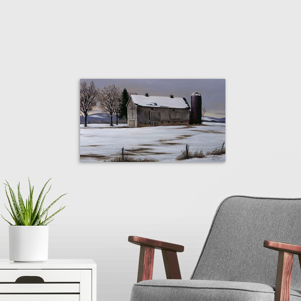A modern room featuring An old barn and silo in a meadow with snow on the ground.
