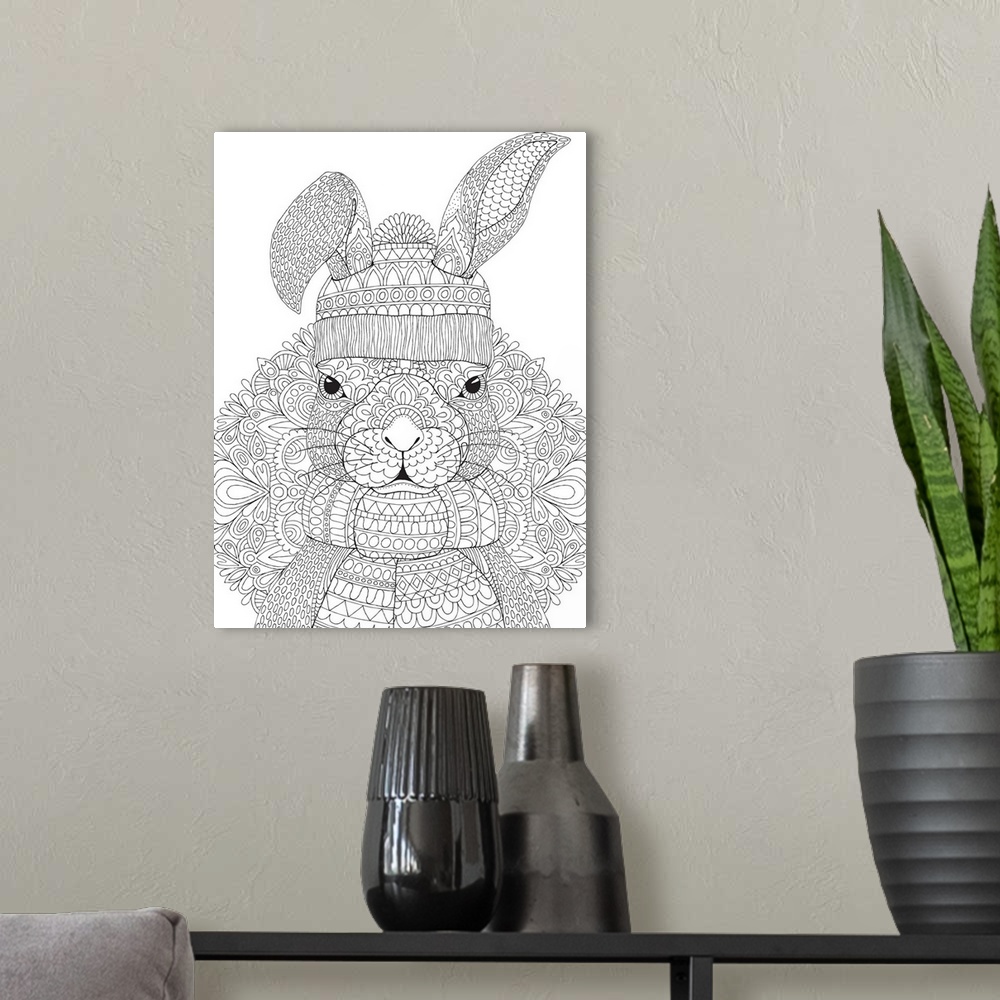 A modern room featuring Black and white lined design of a rabbit wearing a winter hat and scarf.