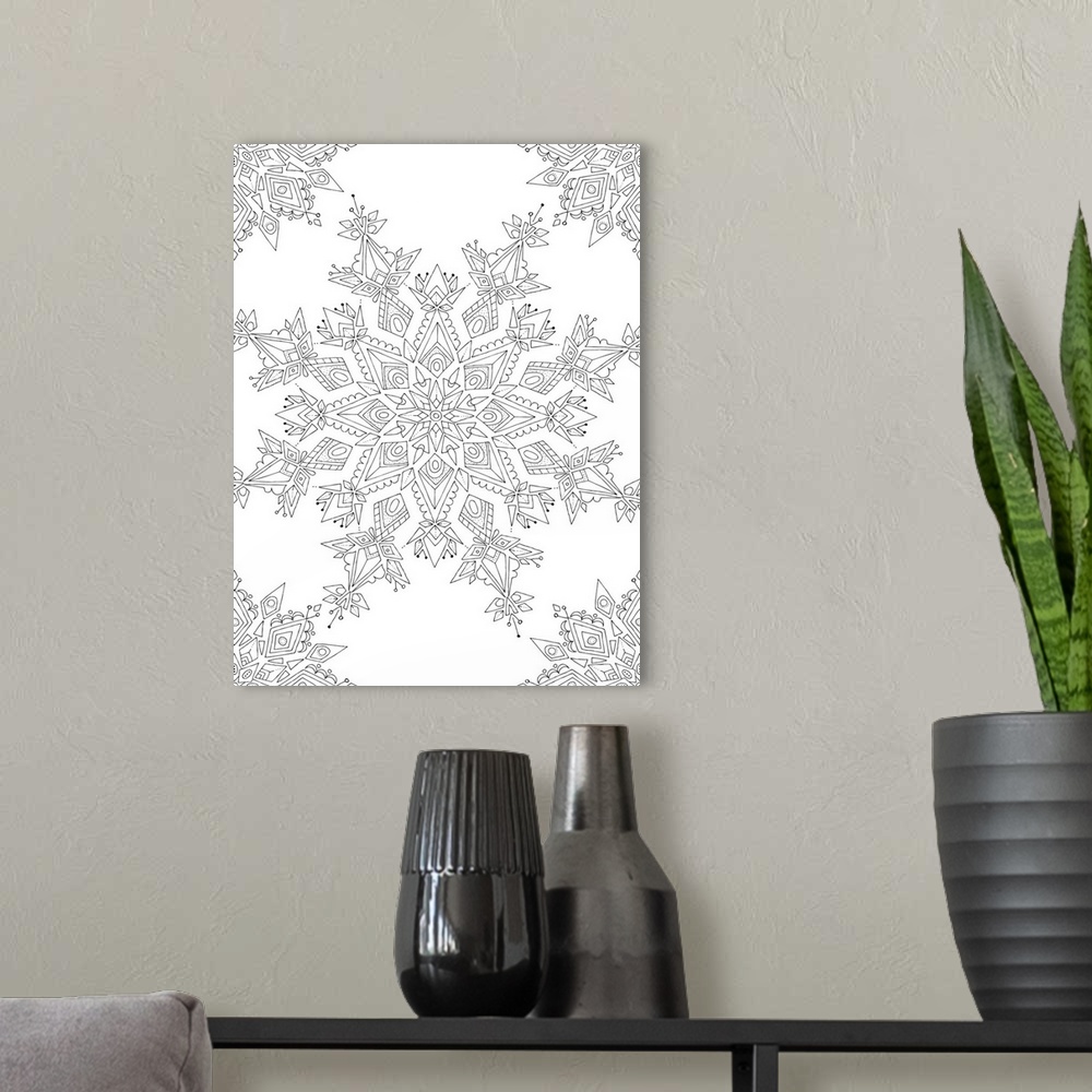 A modern room featuring Black and white line art of intricately designed snowflakes.