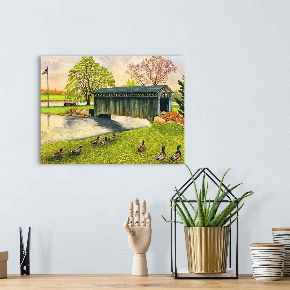 A bohemian room featuring Contemporary artwork of a covered bridge spanning a small river New York.