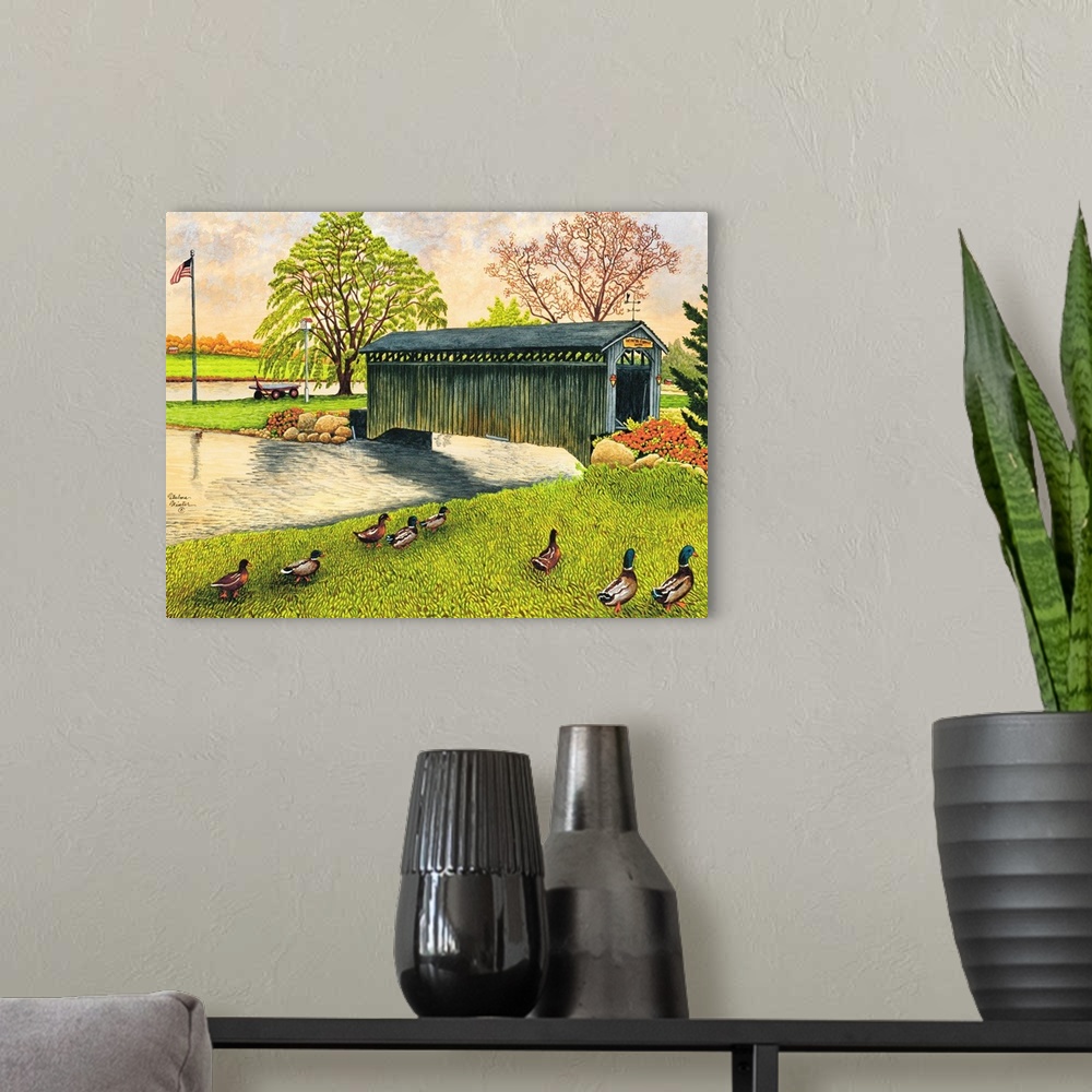 A modern room featuring Contemporary artwork of a covered bridge spanning a small river New York.