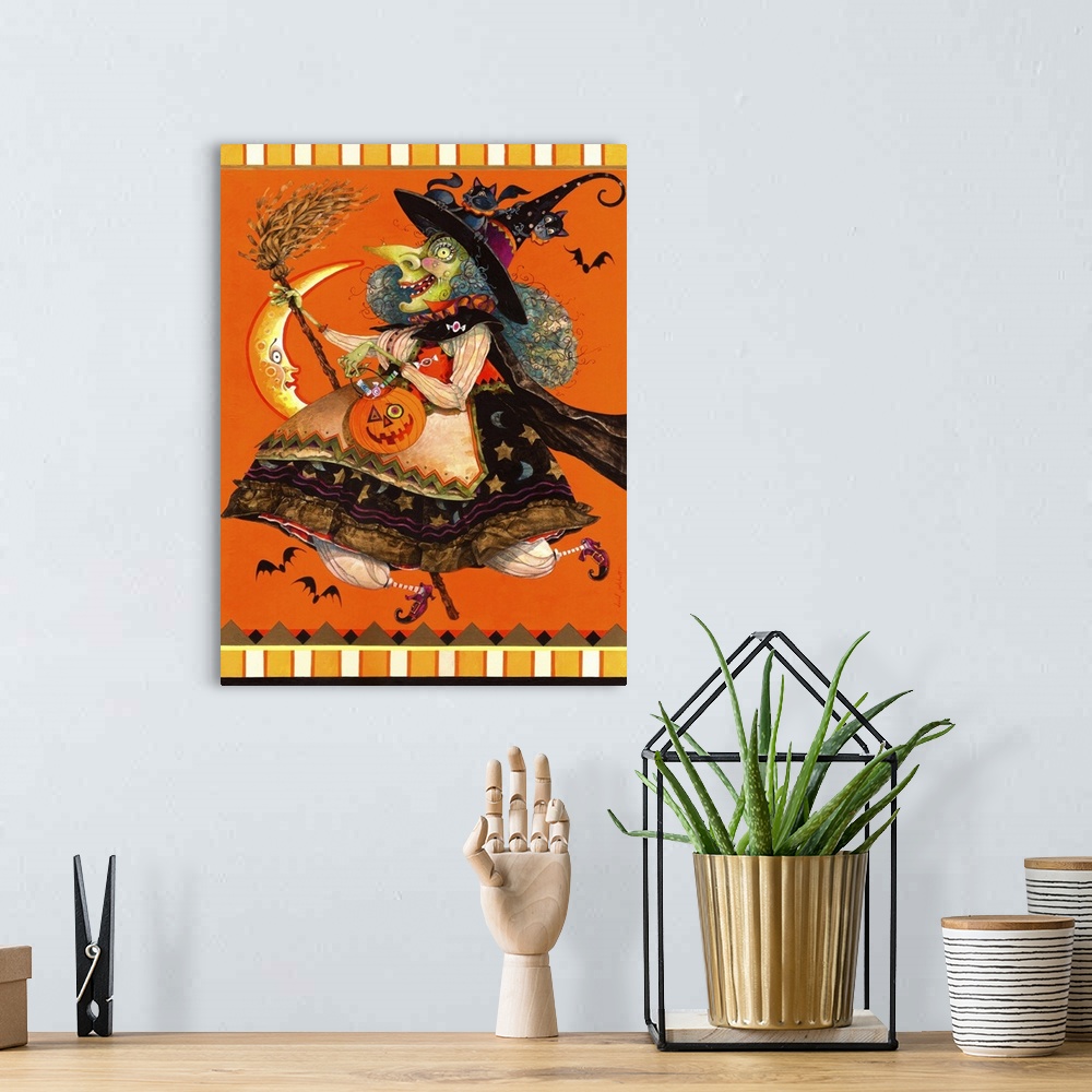 A bohemian room featuring Contemporary artwork of a spooky witch in a happy stride with her head surrounded by bats.