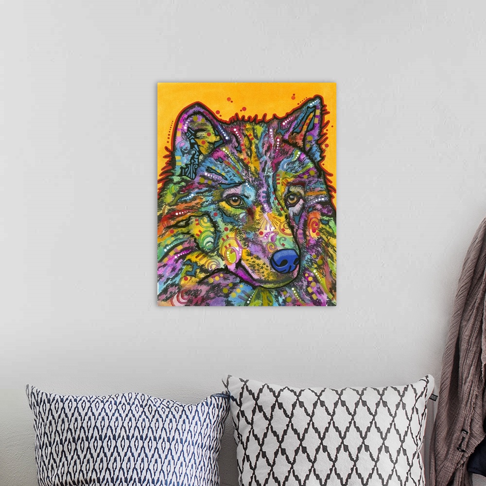 A bohemian room featuring Colorful painting of a wolf with abstract designs on a yellow background with small red dots.