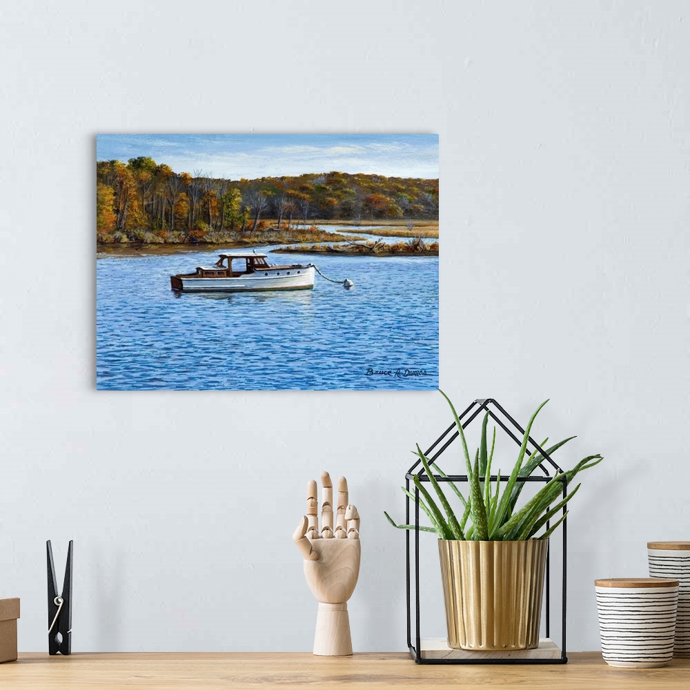A bohemian room featuring Contemporary artwork of a small wooden boat in the water.