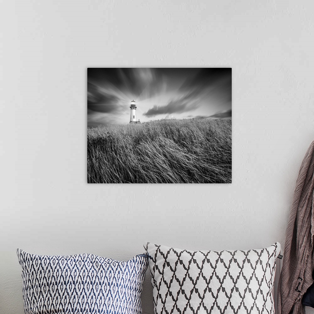 A bohemian room featuring lighthouse, field, clouds, sky, black and white photograph