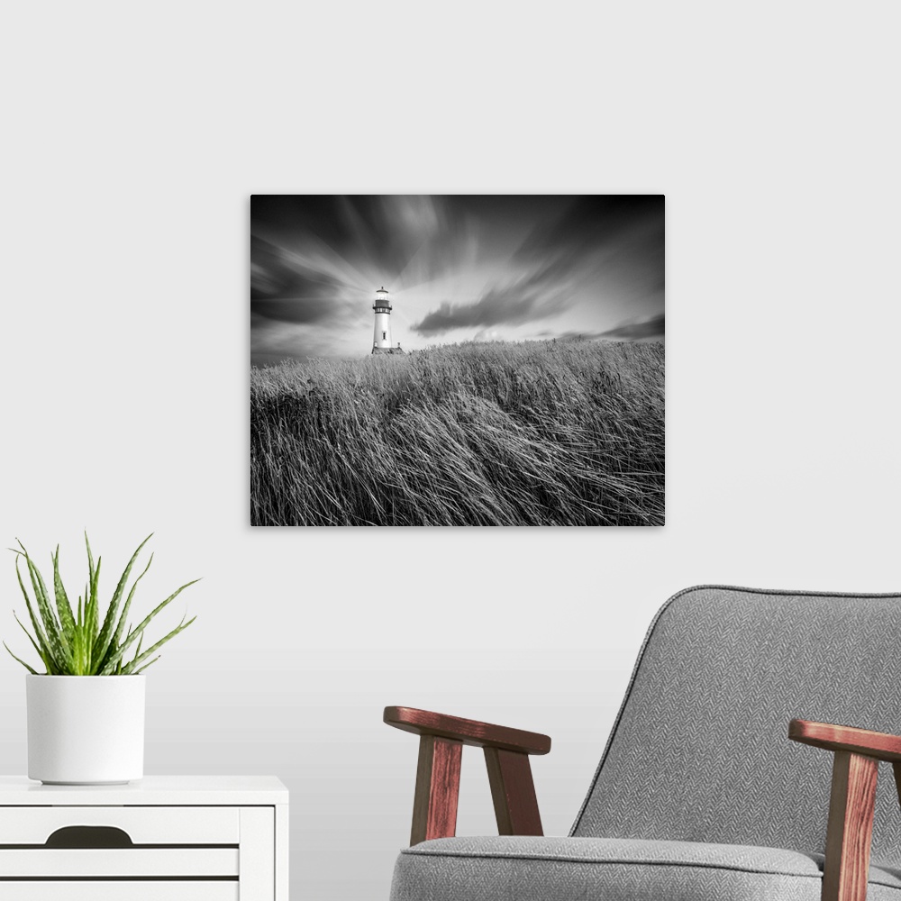 A modern room featuring lighthouse, field, clouds, sky, black and white photograph