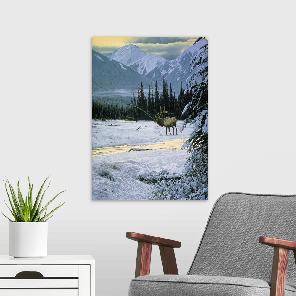 A modern room featuring An elk makes its way across the snow covered landscape.