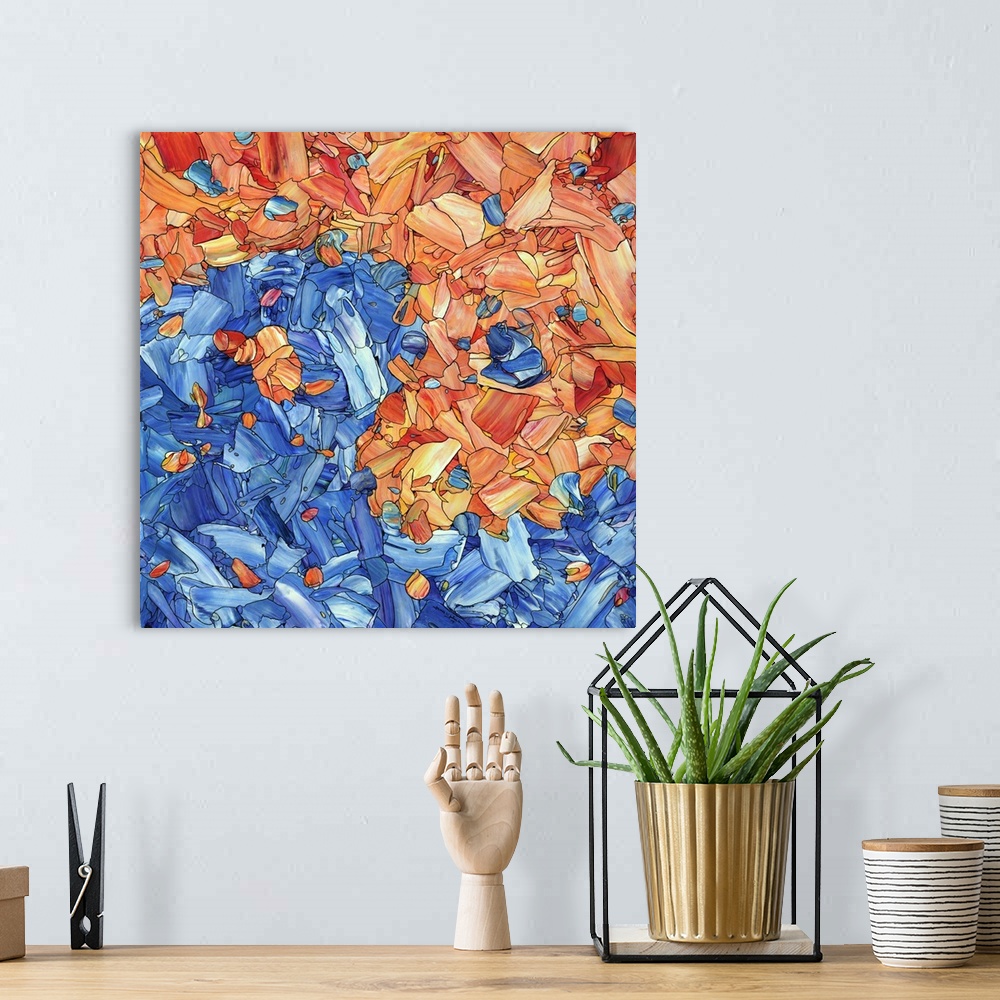 A bohemian room featuring Abstract artwork made of streaks and splatters, resembling a blue and orange yin yang.