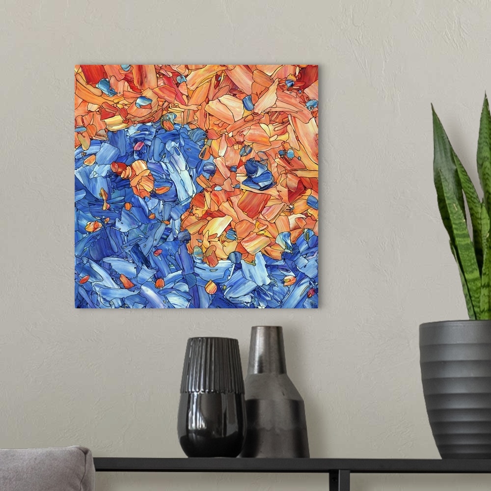 A modern room featuring Abstract artwork made of streaks and splatters, resembling a blue and orange yin yang.