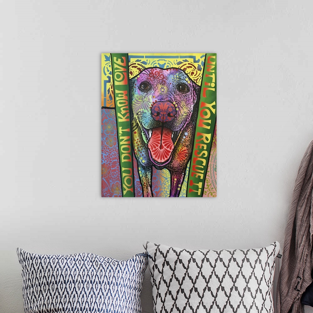 A bohemian room featuring Dog artwork in a graffiti style with text on both sides that reads "You Don't Know Love Until You...